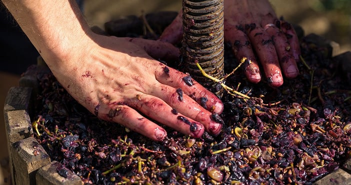 Mountain stone quarry with person standing on edge